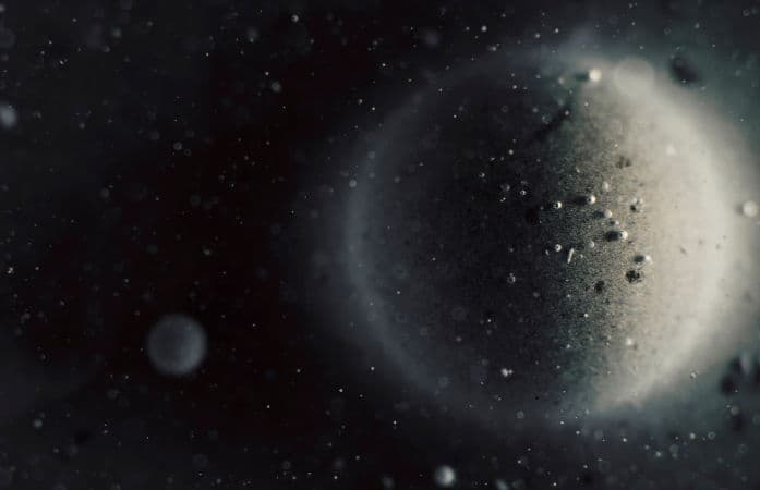 Tiny World Beyond Pluto Shows Signs of Atmosphere, Surprising Scientists